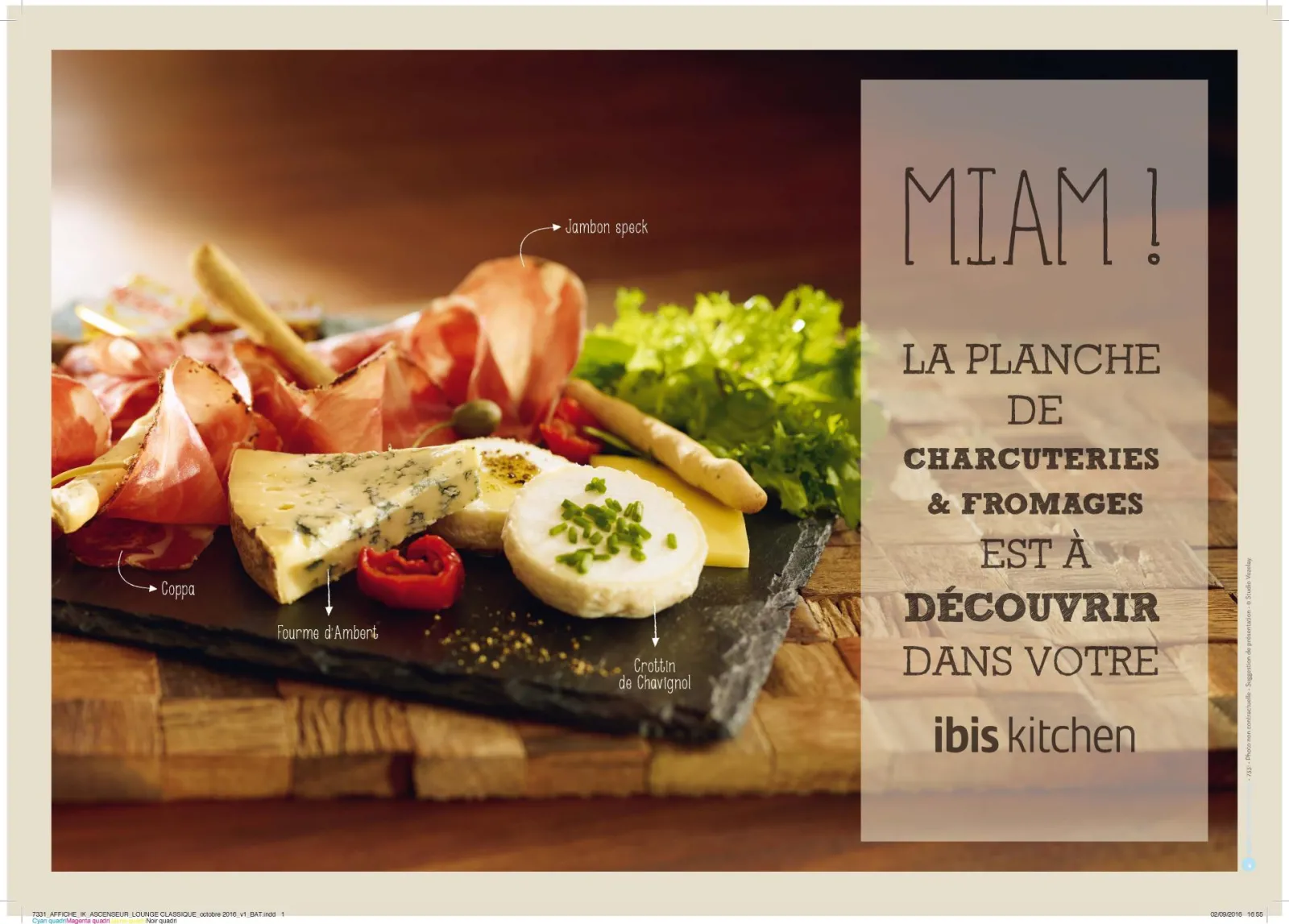 Charcuterie and cheese board from Bordeaux at Ibis Kitchen, featuring speck ham, coppa, Ambert cheese and Chavignol crottin with bread and greens