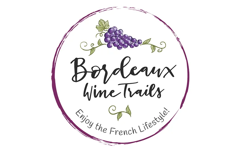 Bordeaux Wine Trails logo featuring purple grapes and 'Enjoy the French Lifestyle' text