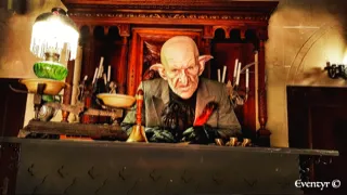 A craftsman or musician works at his workbench in a traditional workshop filled with tools and instruments, in Bordeaux.