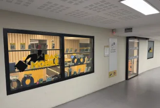 Bag Mobile store frontage in Bordeaux displaying backpacks and accessories in window display with yellow and black signage and glass entrance door