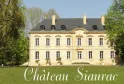 Château Siaurac, an elegant 18th-century Bordeaux mansion featuring a cream-colored façade, mansard roof, and tree-lined grounds