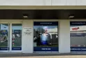 Storefront of Fidso Change bureau de change in Mérignac, Bordeaux, displaying currency exchange services, gold buying, opening hours, and accepted currency flags.